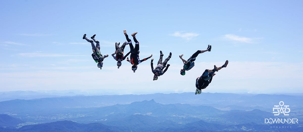 A line of flyers with the horizon behind them