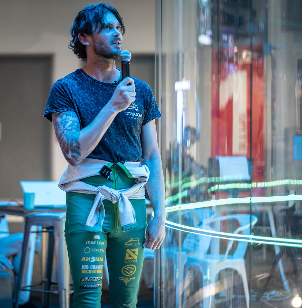 Mason speaking at a Body Piloting event