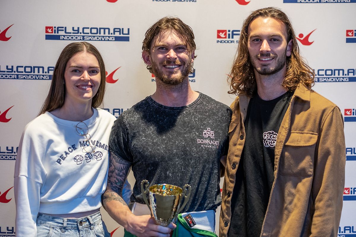 Competitors with the trophy after a Body Piloting final