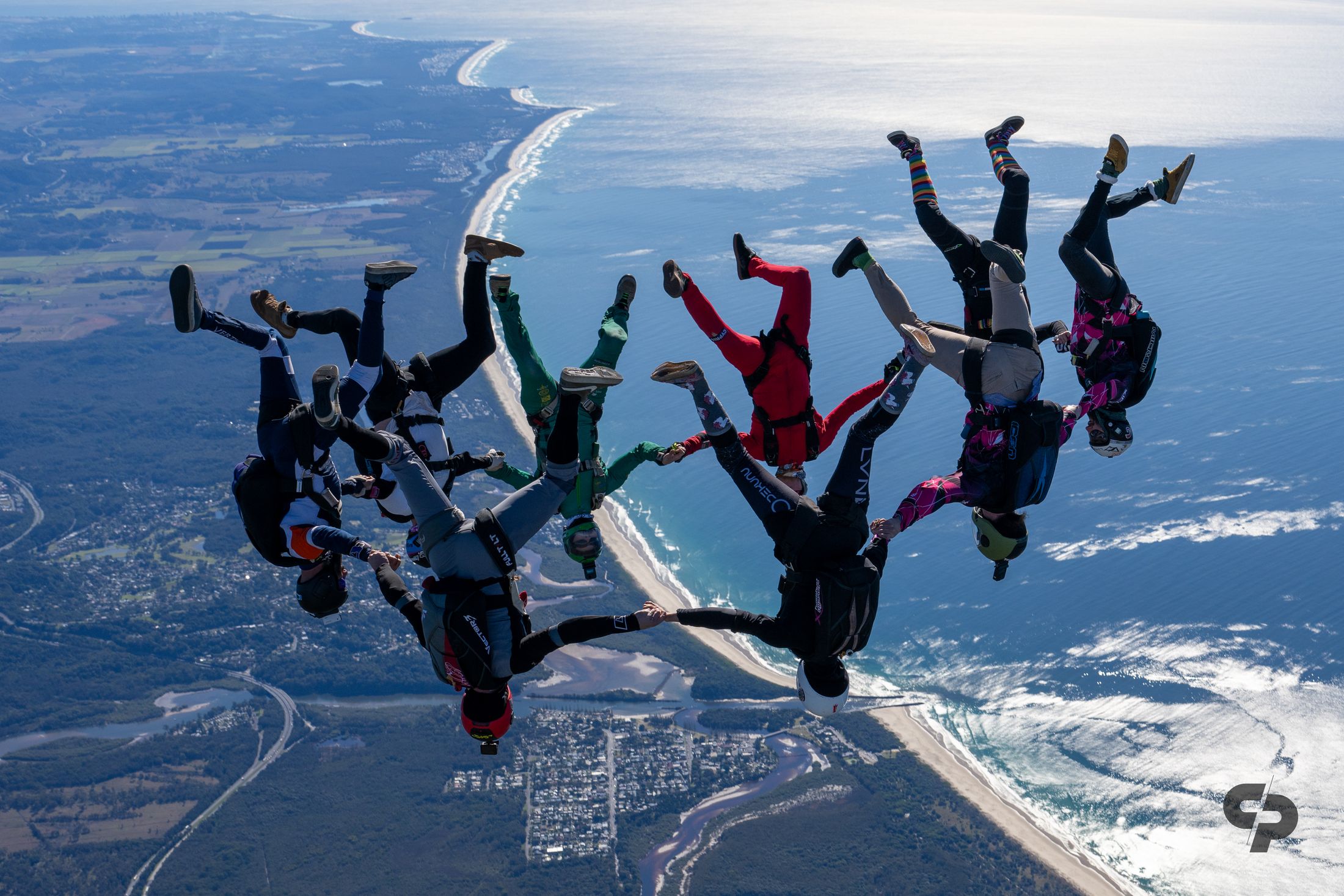 A head-down formation over the coastline