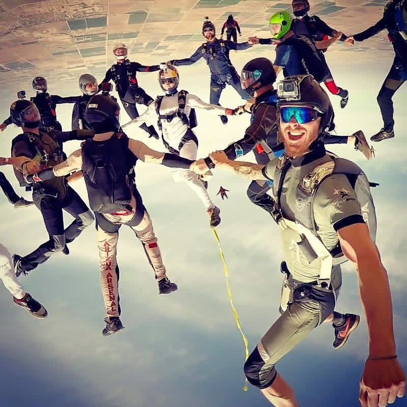 A freefly group selfie in freefall