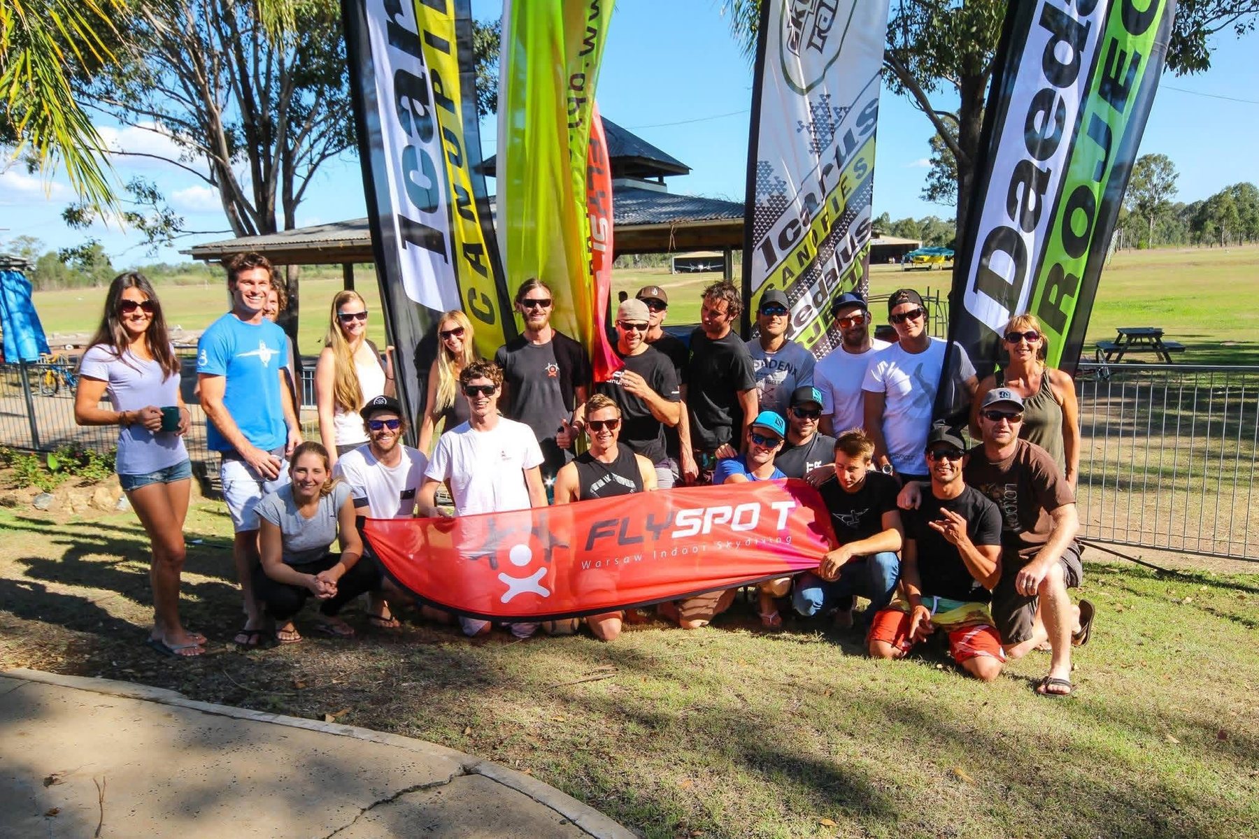 A camp group with their banner on the drop zone