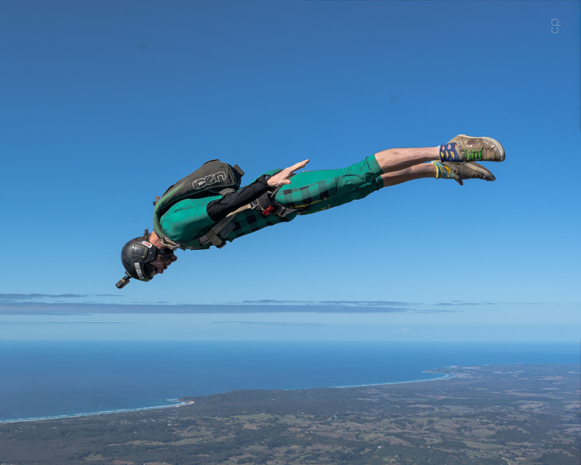 A flyer tracking flat over the coast