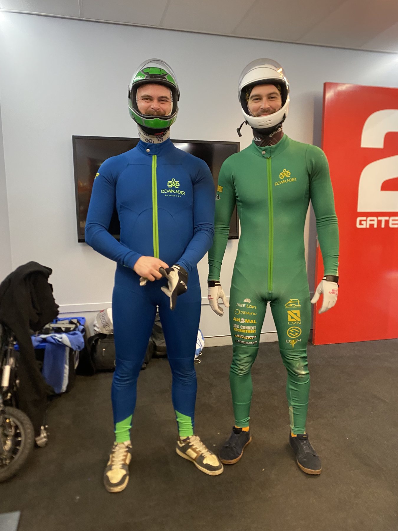 Mason in the blue suit and Harry in the green suit, suited up together at iFLY Downunder