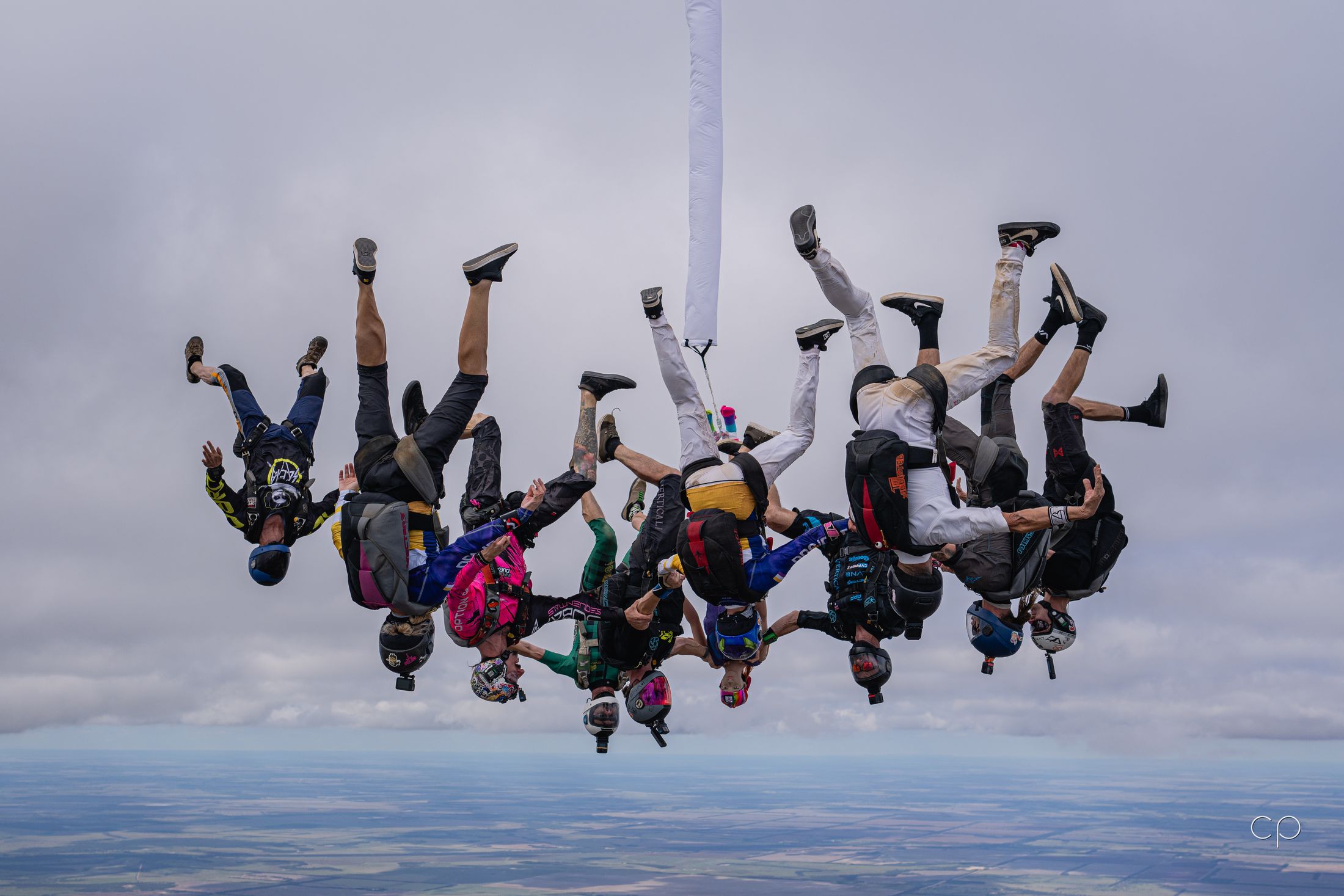 Head-down flyers around an object, in cloud