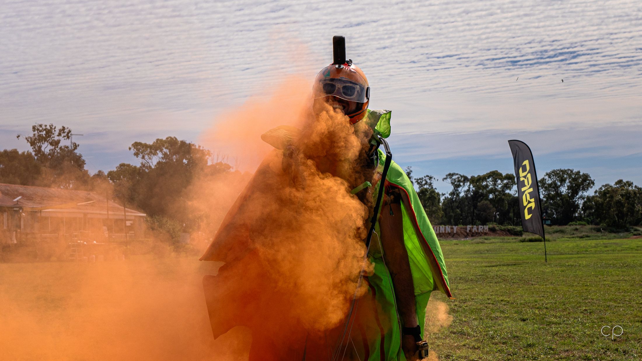 Landing through orange smoke
